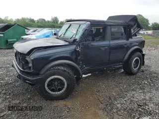 2021 Ford Bronco z VIN 1FMEE5DP5MLB03300, wystawiony jako Copart lot #56737415 z przebiegiem Nie podano mil oraz Szkoda całkowita • Salvage title. Historia ofert i sprzedaży dostępna na DreamBid. Obrazek 1.