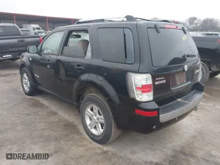 2009 Mercury Mariner Hybrid with VIN 4M2CU29319KJ02879, listed as a IAAI auction lot 41561942 with 135,488 mi miles. Bid and sale history available at carsss.com. Image 3.