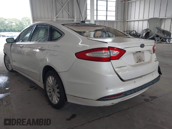 2013 Ford Fusion SE Hybrid with VIN 3FA6P0LU8DR357054, listed as a IAAI auction lot 42372168 with 143,979 mi miles and . Bid and sale history available at DreamBid. Image 3.