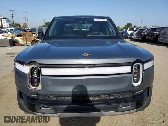 2022 Rivian R1T Adventure z VIN 7FCTGAAA9NN008771, wystawiony jako Copart lot #56243835 z przebiegiem 31 006 mil mil oraz Szkody całkowita. Historia ofert i sprzedaży dostępna na DreamBid. Obrazek 5.