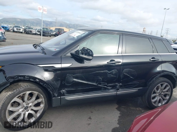 2013 Land Rover Range Rover Evoque Prestige Premium with VIN SALVV2BG8DH808674, listed as a IAAI auction lot 41590565 with 109,191 mi miles and . Bid and sale history available at DreamBid. Image 14.