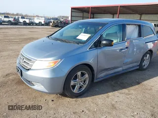2011 Honda Odyssey Touring with VIN 5FNRL5H9XBB085626, listed as a IAAI auction lot 41890577 with 178,317 mi miles and . Bid and sale history available at DreamBid. Image 17.