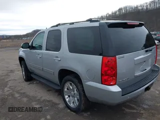 2013 GMC Yukon SLT with VIN 1GKS2CE07DR315820, listed as a IAAI auction lot 41653433 with 137,491 mi miles. Bid and sale history available at carsss.com. Image 3.