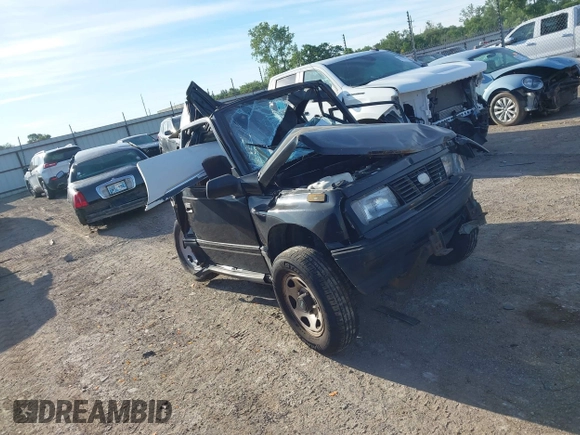 1995 Geo Tracker z VIN 2CNBE18U7S6904490, wystawiony jako IAAI lot #39596307 z przebiegiem 223 933 mil mil oraz . Historia ofert i sprzedaży dostępna na DreamBid. Obrazek 1.