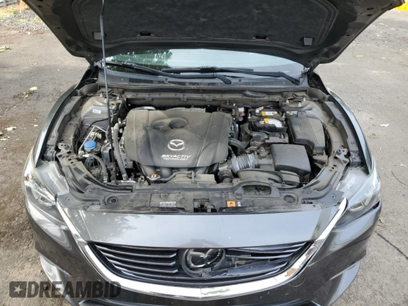 2017 Mazda 6 Grand Touring с VIN JM1GL1W55H1140064, выставлен на аукционе Copart как лот 57503425 с пробегом 74 304 миль миль и Списание • Salvage title. История ставок и продаж доступна на DreamBid. Изображение 11.