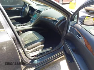 2014 Lincoln MKZ with VIN 3LN6L2GK9ER818561, listed as a IAAI auction lot 42063387 with 143,803 mi miles. Bid and sale history available at carsss.com. Image 5.