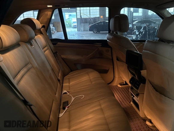 2011 BMW X5 35d with VIN 5UXZW0C55BL661651, listed as a Copart auction lot 61866905 with 162,927 mi miles and Clean title. Bid and sale history available at DreamBid. Image 6.