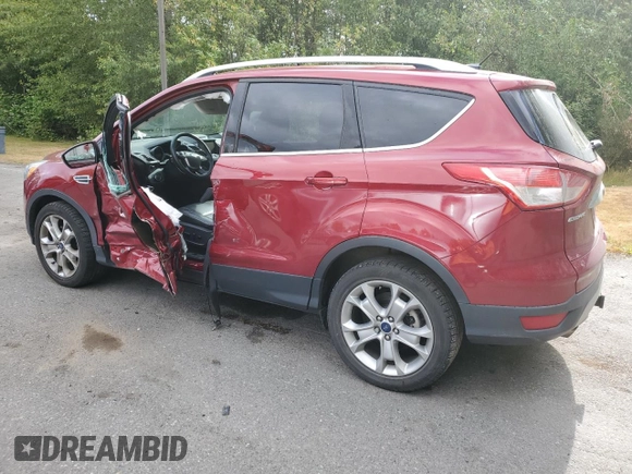 2015 Ford Escape Titanium with VIN 1FMCU9J94FUB92166, listed as a Copart auction lot 61371055 with 96,439 mi miles and Salvage title. Bid and sale history available at DreamBid. Image 2.
