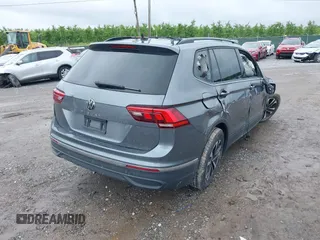 2022 Volkswagen Tiguan S with VIN 3VV1B7AX9NM005125, listed as a IAAI auction lot 42371110 with 94,060 mi miles and . Bid and sale history available at DreamBid. Image 4.
