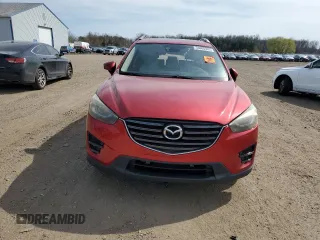 2016 Mazda CX-5 Grand Touring z VIN JM3KE2DY2G0705650, wystawiony jako Copart lot #53808365 z przebiegiem 123 611 mil mil oraz Szkoda całkowita • Salvage title. Historia ofert i sprzedaży dostępna na DreamBid. Obrazek 5.