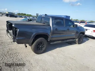 2020 Toyota Tacoma SR5 with VIN 3TMAZ5CN9LM125157, listed as a Copart auction lot 57178885 with 59,830 mi miles and Salvage title. Bid and sale history available at DreamBid. Image 3.