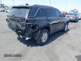 2022 Jeep Grand Cherokee Laredo with VIN 1C4RJHAG2N8595697, listed as a IAAI auction lot 42349561 with 39,073 mi miles and . Bid and sale history available at DreamBid. Image 4.