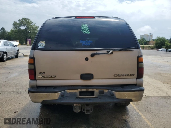 2004 Chevrolet Tahoe LS z VIN 1GNEC13V04J307606, wystawiony jako Copart lot #51999585 z przebiegiem 262 220 mil mil oraz Szkoda całkowita • Salvage title. Historia ofert i sprzedaży dostępna na DreamBid. Obrazek 6.