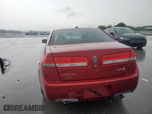 2010 Lincoln MKZ z VIN 3LNHL2GC6AR629927, wystawiony jako Copart lot #54663265 z przebiegiem 39 451 mil mil oraz Czysty tytuł • Clean title. Historia ofert i sprzedaży dostępna na DreamBid. Obrazek 6.