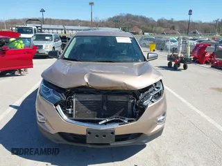 2018 Chevrolet Equinox LS with VIN 2GNAXHEV2J6160948, listed as a IAAI auction lot 41818156 with 152,457 mi miles and . Bid and sale history available at DreamBid. Image 12.