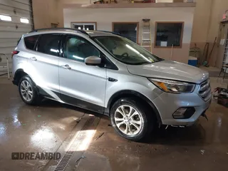 2018 Ford Escape SE with VIN 1FMCU0G94JUB62791, listed as a IAAI auction lot 41410702 with 115,180 mi miles. Bid and sale history available at carsss.com. Image 1.