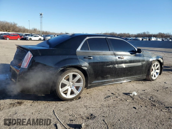 2012 Chrysler 300 SRT8 with VIN 2C3CCAFJ0CH800893, listed as a Copart auction lot 88352515 with 143,381 mi miles and Salvage Title. Bid and sale history available at carsss.com. Image 3.