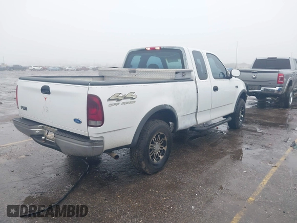1997 Ford F-150 XL with VIN 1FTDX1863VNB01474, listed as a IAAI auction lot 41446672 with 223,296 mi miles. Bid and sale history available at carsss.com. Image 4.