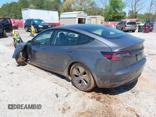 2023 Tesla Model 3 z VIN 5YJ3E1EA0PF655244, wystawiony jako IAAI lot #42004592 z przebiegiem 54 860 mil mil oraz . Historia ofert i sprzedaży dostępna na DreamBid. Obrazek 3.