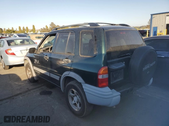 2004 Chevrolet Tracker ZR2 with VIN 2CNBJ734246907452, listed as a Copart auction lot 73102754 with 286,234 mi miles and Clean title. Bid and sale history available at DreamBid. Image 2.