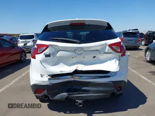 2015 Mazda CX-5 Grand Touring with VIN JM3KE2DYXF0493370, listed as a IAAI auction lot 42087156 with 161,464 mi miles. Bid and sale history available at carsss.com. Image 16.