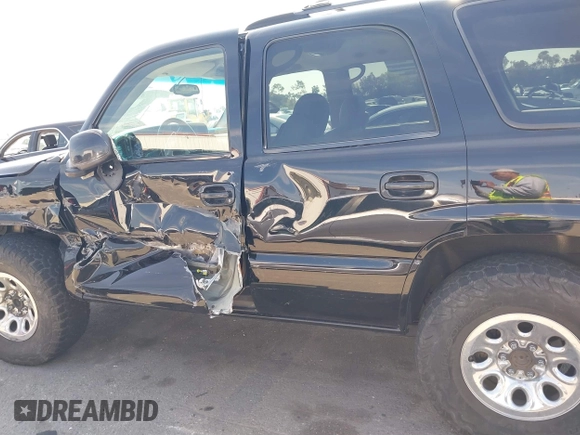 2002 GMC Yukon SLT with VIN 1GKEC13T92R162978, listed as a IAAI auction lot 41851599 with 213,789 mi miles. Bid and sale history available at carsss.com. Image 14.