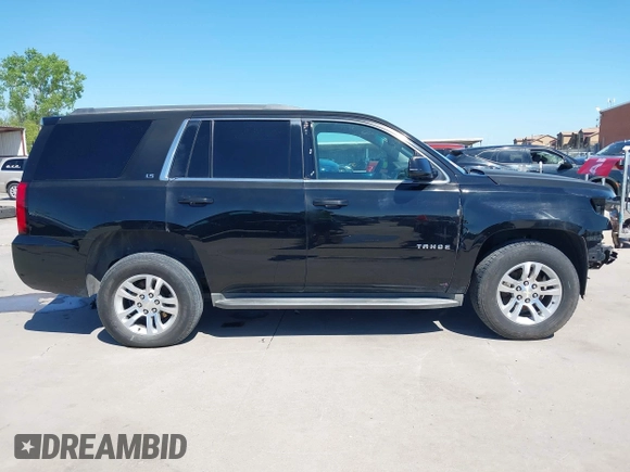 2015 Chevrolet Tahoe LS with VIN 1GNSCAKC5FR645736, listed as a IAAI auction lot 42064623 with 223,149 mi miles and . Bid and sale history available at DreamBid. Image 14.