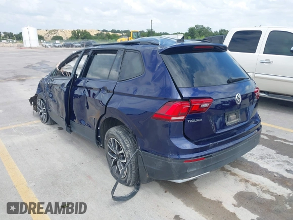 2021 Volkswagen Tiguan S with VIN 3VV1B7AX4MM150765, listed as a IAAI auction lot 42505134 with 19,590 mi miles and . Bid and sale history available at DreamBid. Image 3.