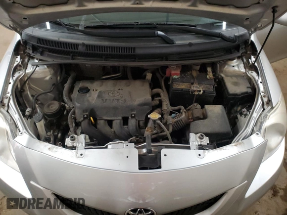 2012 Toyota Yaris z VIN JTDBT4K30CL016555, wystawiony jako Copart lot #55605565 z przebiegiem 164 046 mil mil oraz Szkoda całkowita • Salvage title. Historia ofert i sprzedaży dostępna na DreamBid. Obrazek 11.