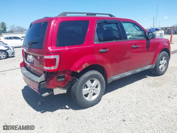 2010 Ford Escape XLT with VIN 1FMCU0D75AKB11394, listed as a IAAI auction lot 42037996 with 150,815 mi miles. Bid and sale history available at carsss.com. Image 4.