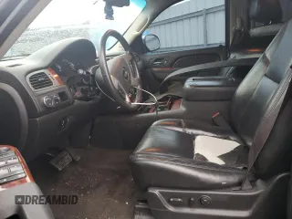 2014 Chevrolet Suburban LTZ with VIN 1GNSCKE08ER230741, listed as a Copart auction lot 47234095 with 184,263 mi miles and Salvage title. Bid and sale history available at DreamBid. Image 7.