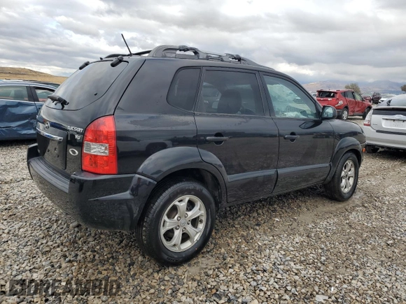 2009 Hyundai Tucson SE with VIN KM8JN72D49U975875, listed as a Copart auction lot 76923954 with 167,155 mi miles and Salvage Title. Bid and sale history available at carsss.com. Image 3.