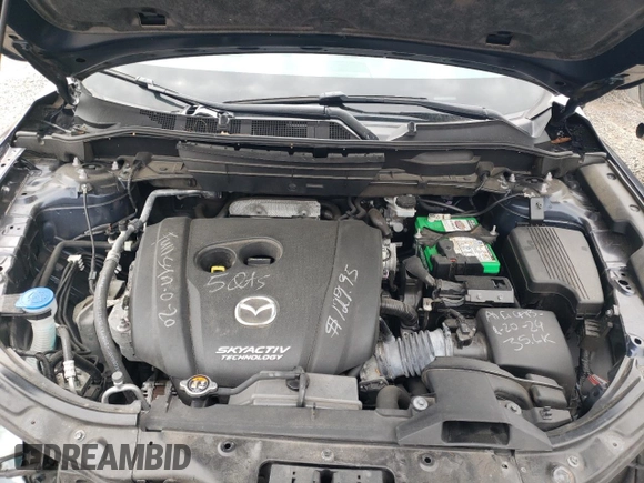 2018 Mazda CX-5 Touring with VIN JM3KFBCM7J0358769, listed as a Copart auction lot 53569775 with 37,198 mi miles and Salvage Title. Bid and sale history available at DreamBid. Image 12.