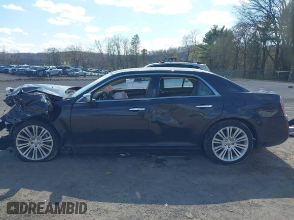 2012 Chrysler 300 C Luxury Series with VIN 2C3CCAPT3CH253909, listed as a IAAI auction lot 41990734 with 95,881 mi miles and . Bid and sale history available at carsss.com. Image 14.