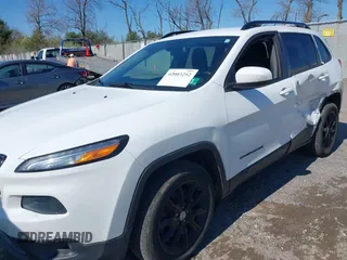 2014 Jeep Cherokee Latitude with VIN 1C4PJMCS9EW309289, listed as a IAAI auction lot 42003252 with 99,360 mi miles and . Bid and sale history available at DreamBid. Image 17.