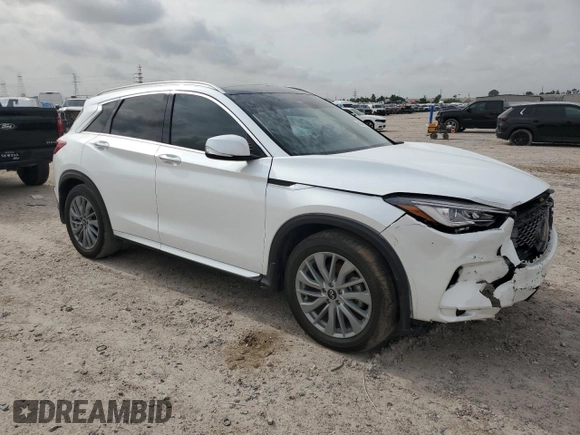 2023 Infiniti QX50 Luxe with VIN 3PCAJ5BA3PF114574, listed as a Copart auction lot 55118255 with 25,803 mi miles and Salvage title. Bid and sale history available at DreamBid. Image 4.