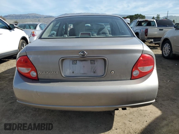 2000 Nissan Maxima GXE z VIN JN1CA31D2YT726856, wystawiony jako Copart lot #45950615 z przebiegiem 101 919 mil mil oraz Szkoda całkowita • Salvage title. Historia ofert i sprzedaży dostępna na DreamBid. Obrazek 6.