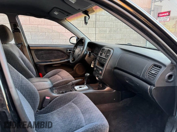 2004 Hyundai Sonata with VIN KMHWF25H94A000139, listed as a Copart auction lot 42974655 with 129,267 mi miles and Clean Title. Bid and sale history available at carsss.com. Image 5.
