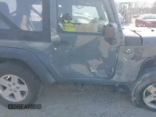 2014 Jeep Wrangler Sport with VIN 1C4AJWAG5EL271318, listed as a IAAI auction lot 41780040 with 128,942 mi miles and . Bid and sale history available at DreamBid. Image 13.