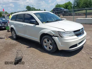 2013 Dodge Journey American Value with VIN 3C4PDCAB7DT516563, listed as a IAAI auction lot 42636328 with 200,995 mi miles and . Bid and sale history available at DreamBid. Image 1.