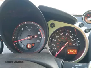 2015 Nissan 370Z Sport z VIN JN1AZ4EH5FM442339, wystawiony jako IAAI lot #42304030 z przebiegiem 73 272 mil mil oraz . Historia ofert i sprzedaży dostępna na DreamBid. Obrazek 7.