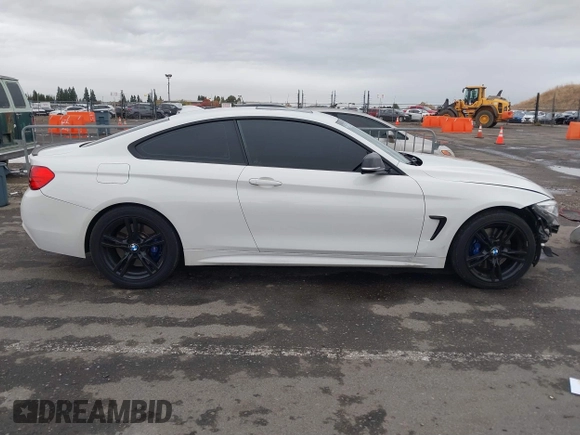 2014 BMW 4 Series 428i xDrive with VIN WBA3N5C56EK196702, listed as a IAAI auction lot 40934482 with 120,292 mi miles. Bid and sale history available at carsss.com. Image 14.