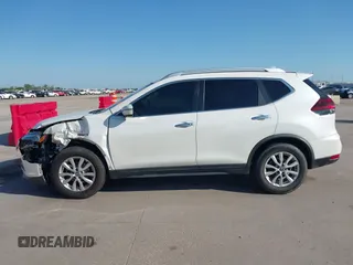 2019 Nissan Rogue SV with VIN KNMAT2MTXKP554619, listed as a IAAI auction lot 41975101 with 86,051 mi miles and . Bid and sale history available at DreamBid. Image 14.
