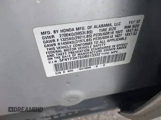 2013 Honda Pilot EX-L with VIN 5FNYF3H76DB013332, listed as a IAAI auction lot 41193240 with 121,308 mi miles and . Bid and sale history available at DreamBid. Image 9.