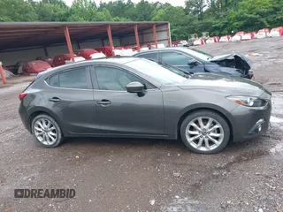 2016 Mazda 3 S Grand Touring z VIN JM1BM1N33G1277798, wystawiony jako IAAI lot #42337611 z przebiegiem 91 519 mil mil oraz . Historia ofert i sprzedaży dostępna na DreamBid. Obrazek 13.