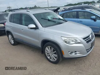 2011 Volkswagen Tiguan SE with VIN WVGBV7AX2BW570219, listed as a IAAI auction lot 42756647 with 119,022 mi miles and . Bid and sale history available at DreamBid. Image 1.