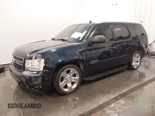 2007 Chevrolet Tahoe LS with VIN 1GNFC13C87R394003, listed as a IAAI auction lot 42206597 with 147,358 mi miles and . Bid and sale history available at DreamBid. Image 19.