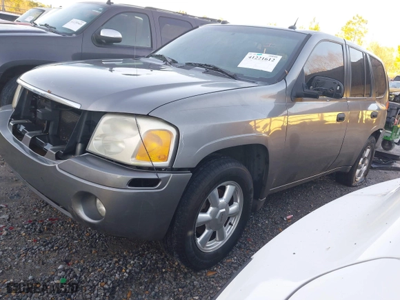 2005 GMC Envoy SLE with VIN 1GKDS13S352215032, listed as a IAAI auction lot 41221612 with 260,647 mi miles. Bid and sale history available at carsss.com. Image 2.
