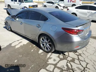 2014 Mazda Mazda6 i Touring with VIN JM1GJ1T58E1104066, listed as a Copart auction lot 46655205 with 130,857 mi miles and Salvage Title. Bid and sale history available at carsss.com. Image 2.