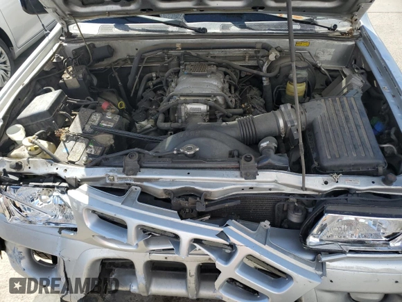 2000 Isuzu Rodeo z VIN 4S2DM58W8Y4331154, wystawiony jako Copart lot #49507535 z przebiegiem 198 476 mil mil oraz Szkody całkowita. Historia ofert i sprzedaży dostępna na DreamBid. Obrazek 12.
